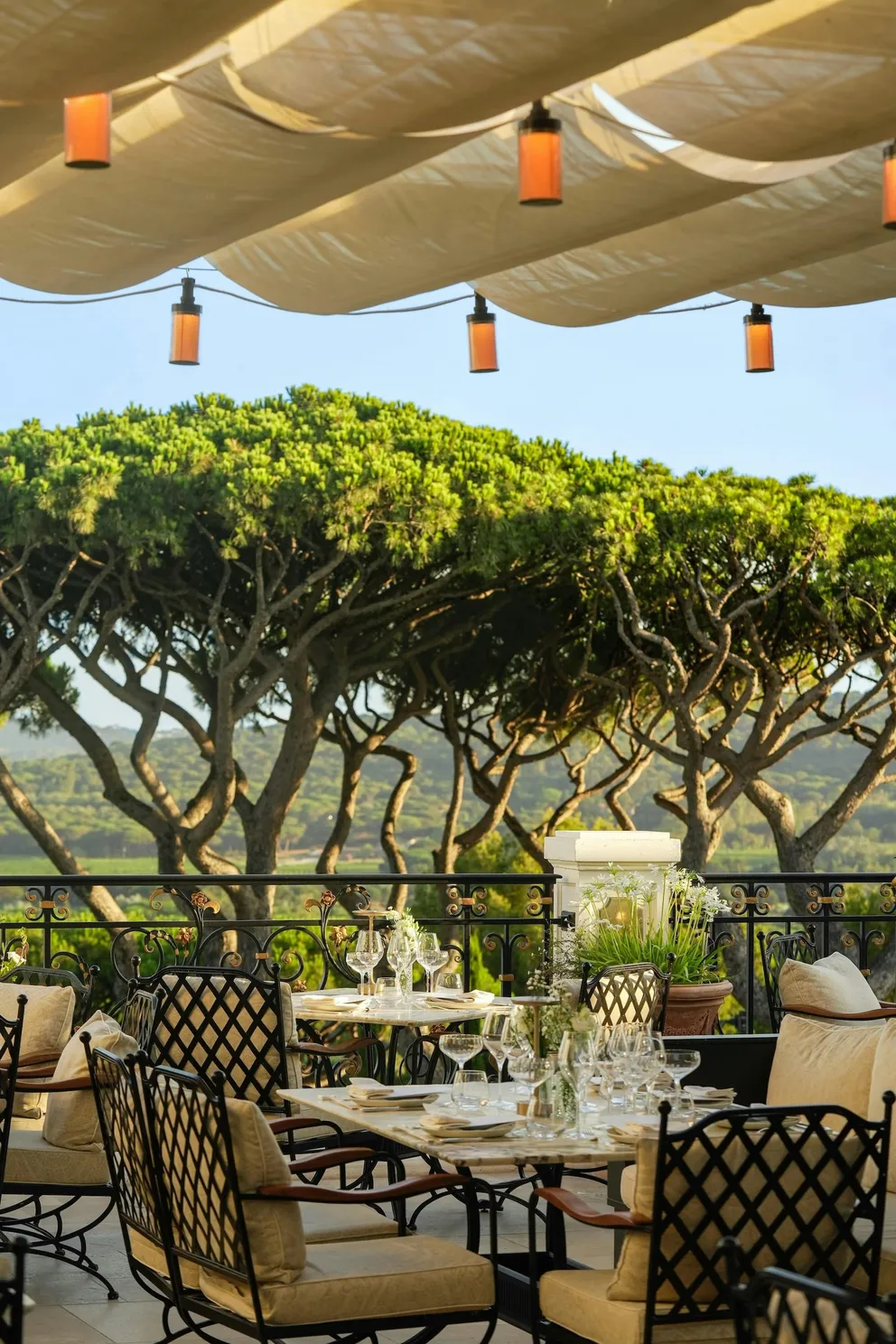 The terrace at Matsuhisa Saint-Tropez, under a canopy hung with lanterns