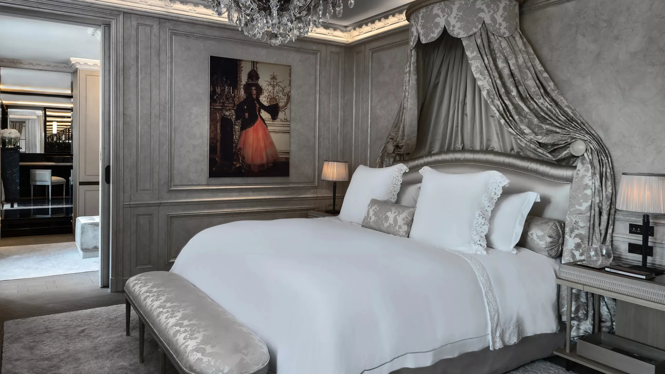 Grand suite with crystal chandelier, fireplace, and classical symmetrical layout