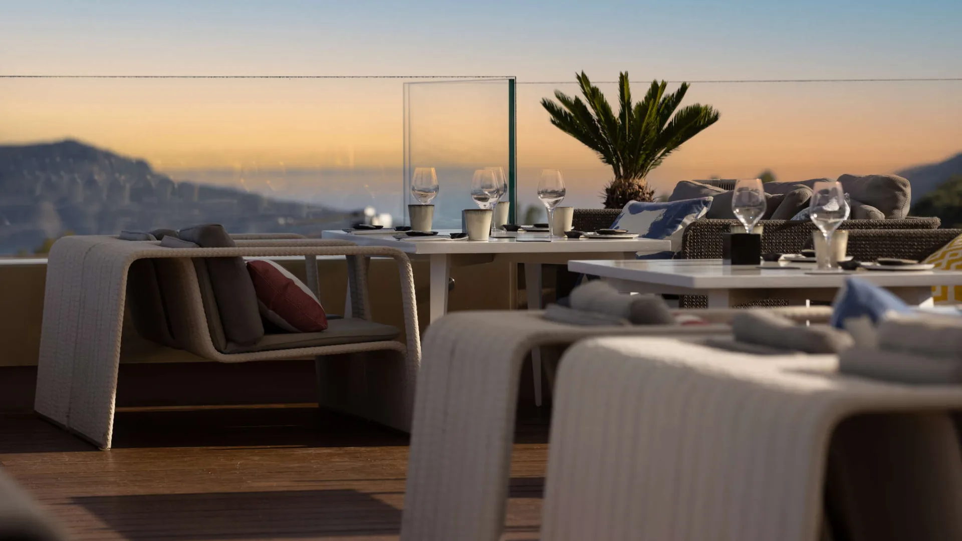 Restaurant interior with dining tables and mountain views