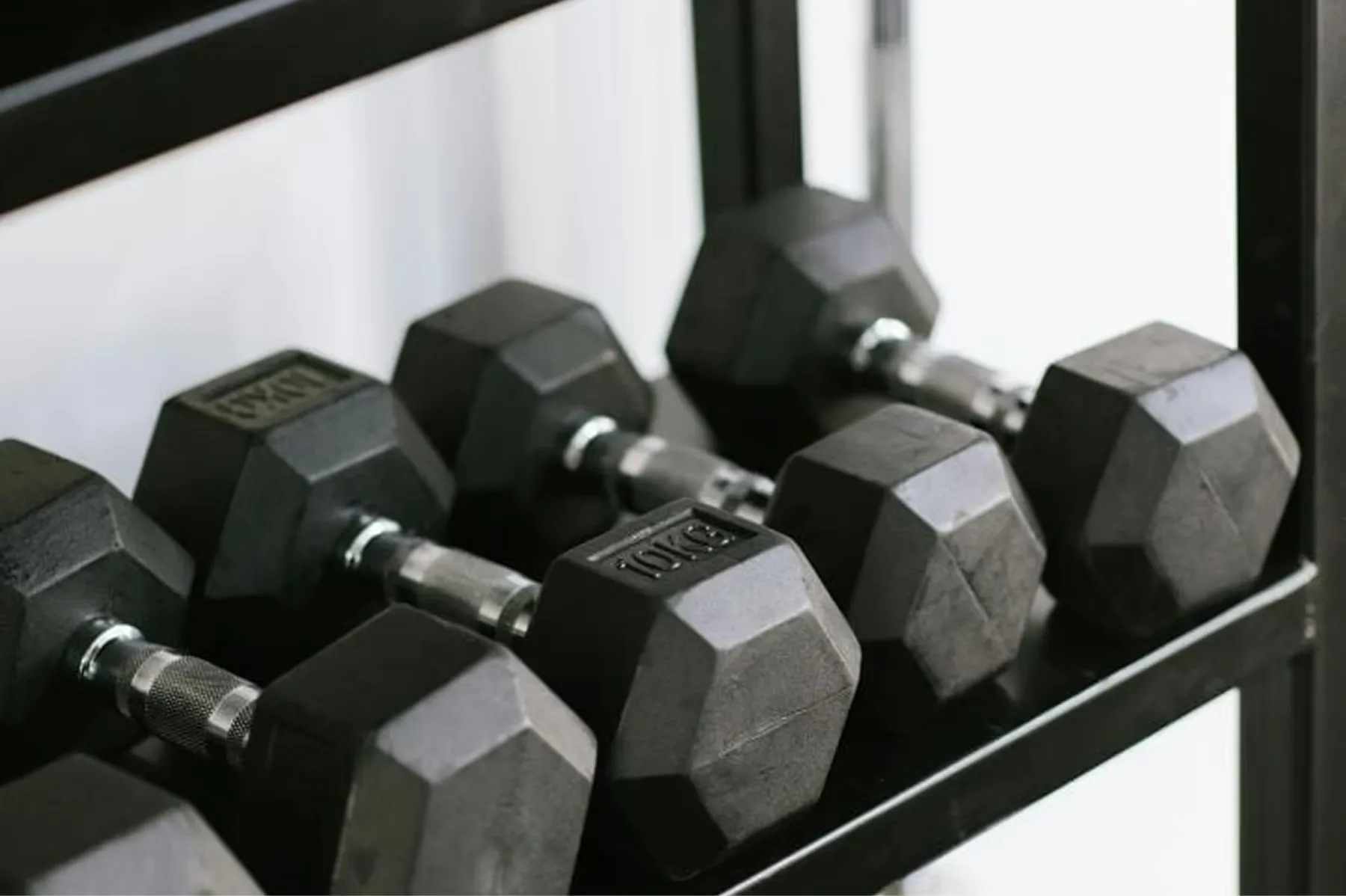 Fitness center with free weights on rack