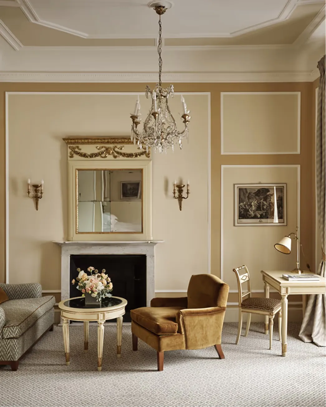 An elegant neoclassical drawing room with marble fireplace, crystal chandelier, and arched ceiling